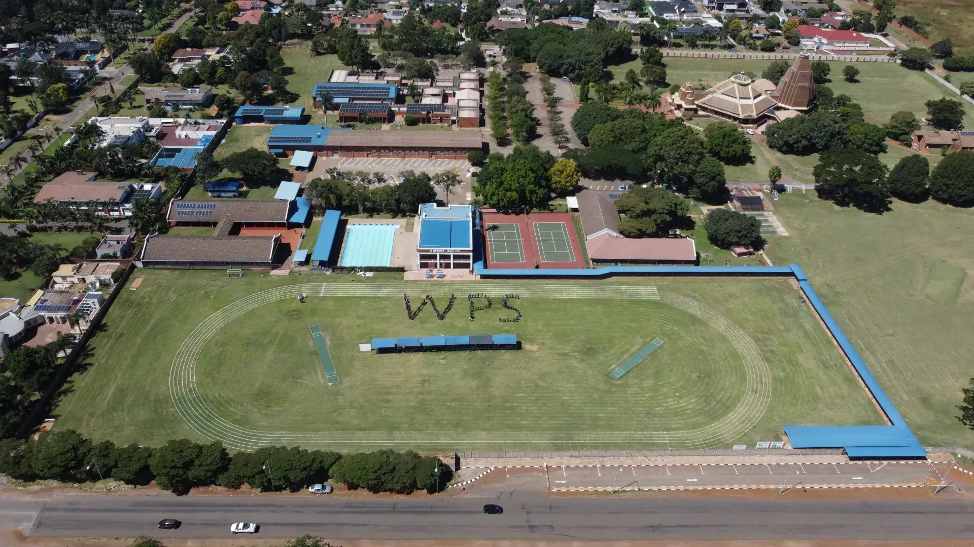 The Westridge campus from the air, with “WPS” mown into the sports field