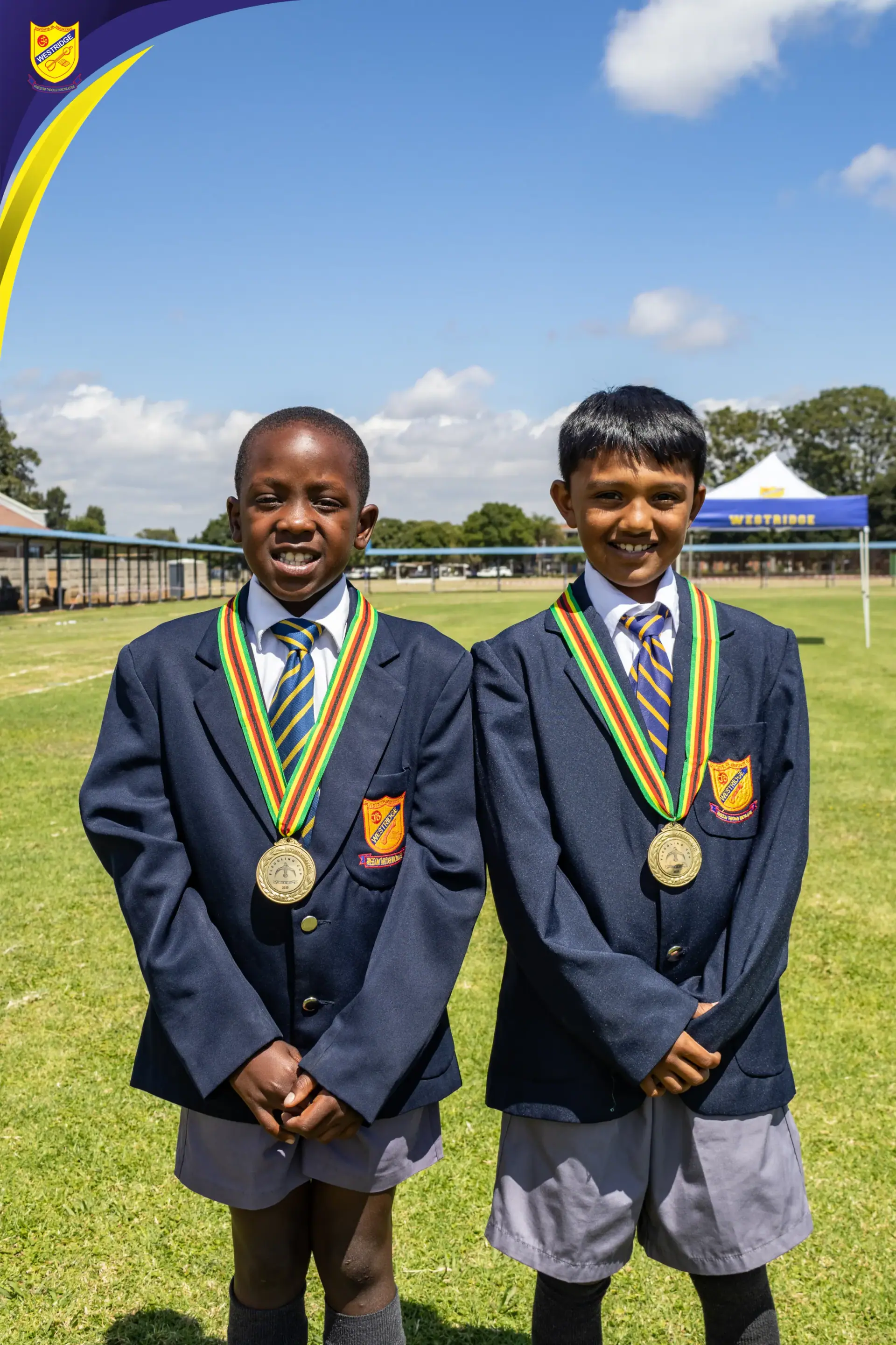 Two Westridge achievers wearing their medals