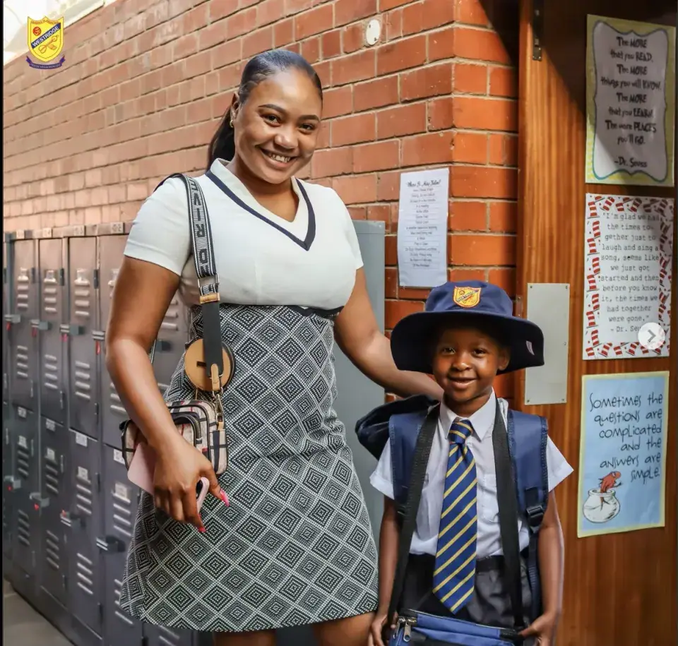 A parent and her son on his first day of Grade 1