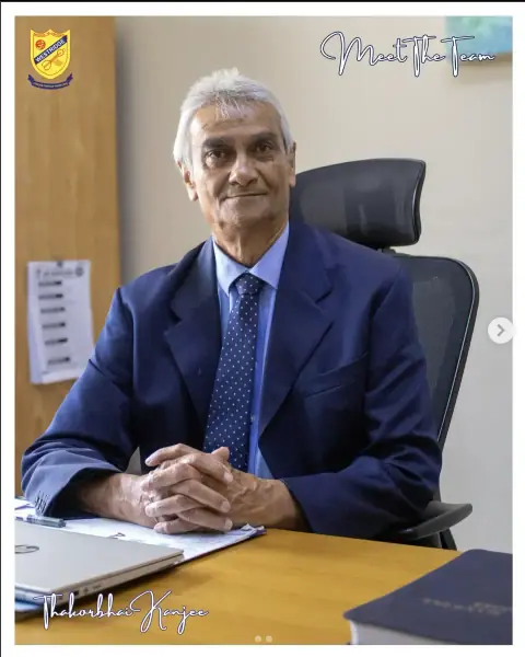 The Headmaster, Mr Kanjee, at his desk